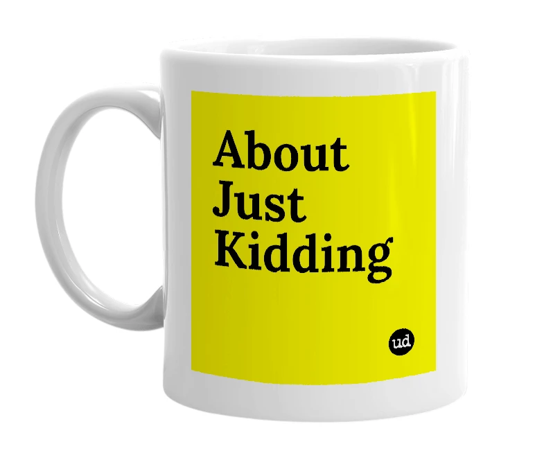 White mug with 'About Just Kidding' in bold black letters