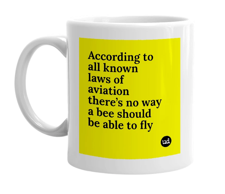 White mug with 'According to all known laws of aviation there’s no way a bee should be able to fly' in bold black letters