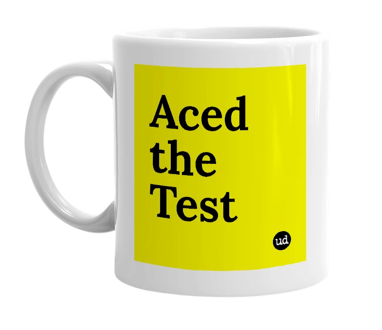White mug with 'Aced the Test' in bold black letters