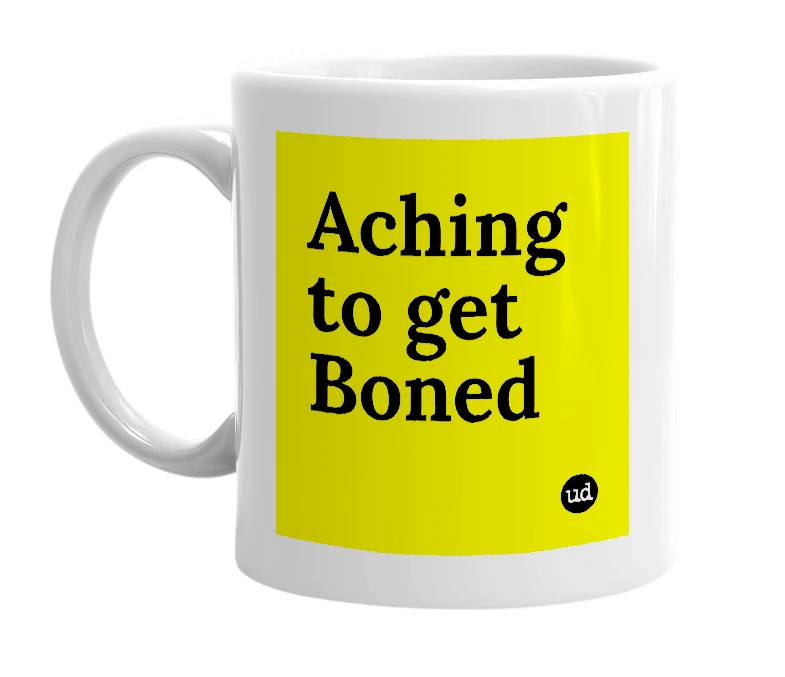White mug with 'Aching to get Boned' in bold black letters