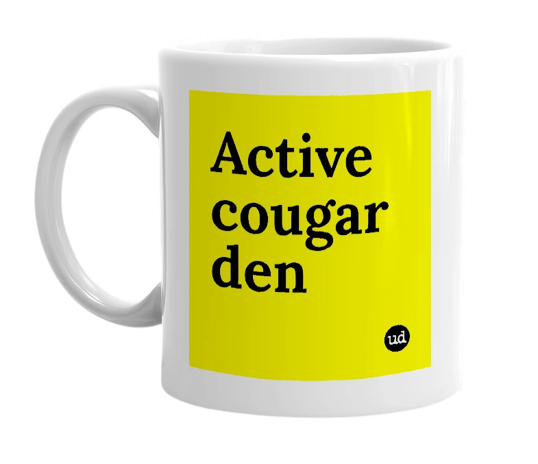 White mug with 'Active cougar den' in bold black letters