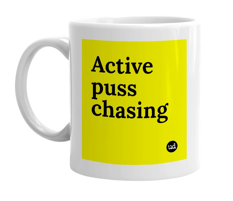 White mug with 'Active puss chasing' in bold black letters