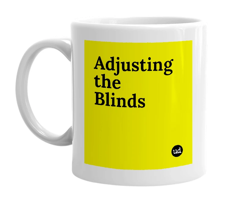 White mug with 'Adjusting the Blinds' in bold black letters