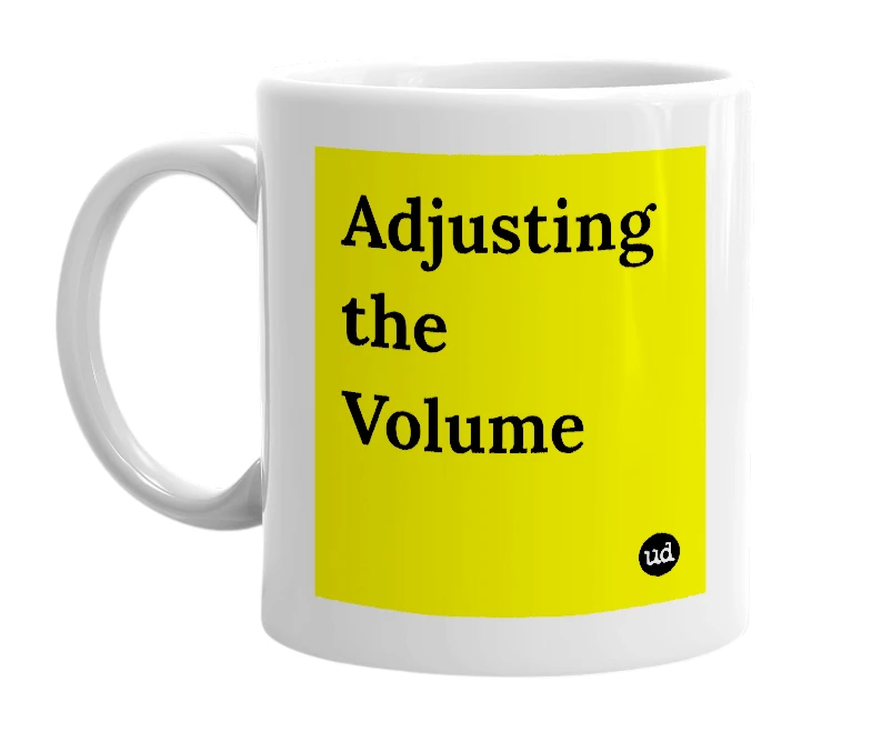 White mug with 'Adjusting the Volume' in bold black letters