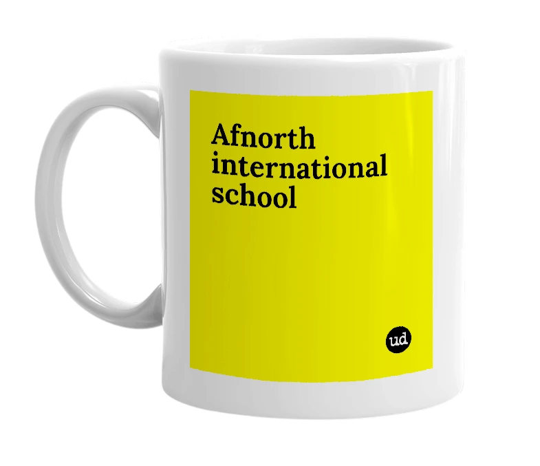 White mug with 'Afnorth international school' in bold black letters