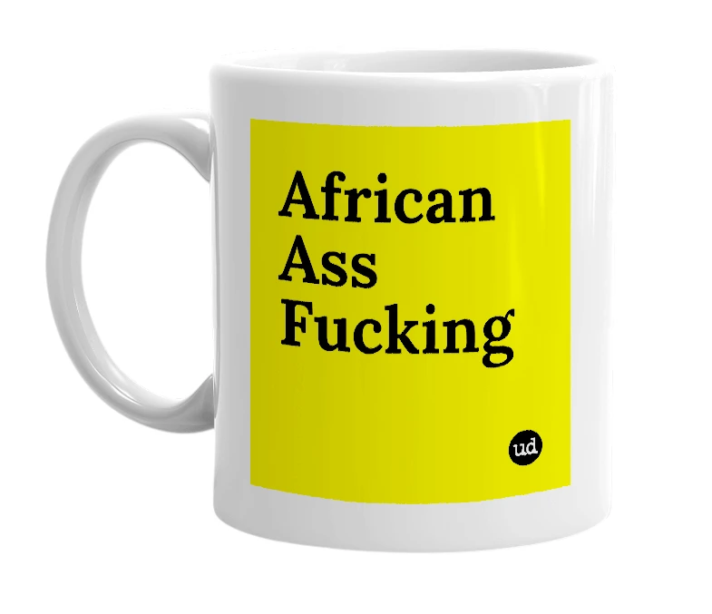 White mug with 'African Ass Fucking' in bold black letters