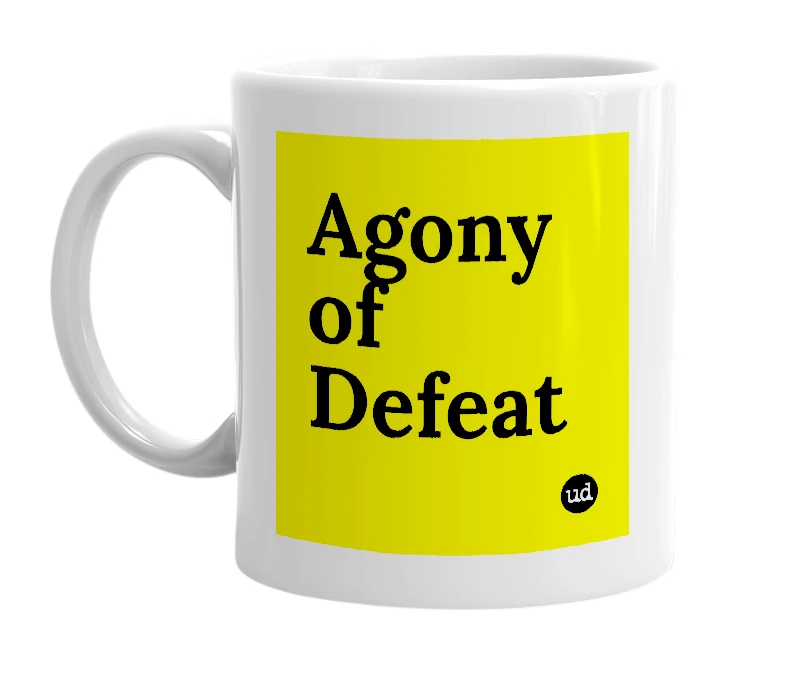 White mug with 'Agony of Defeat' in bold black letters