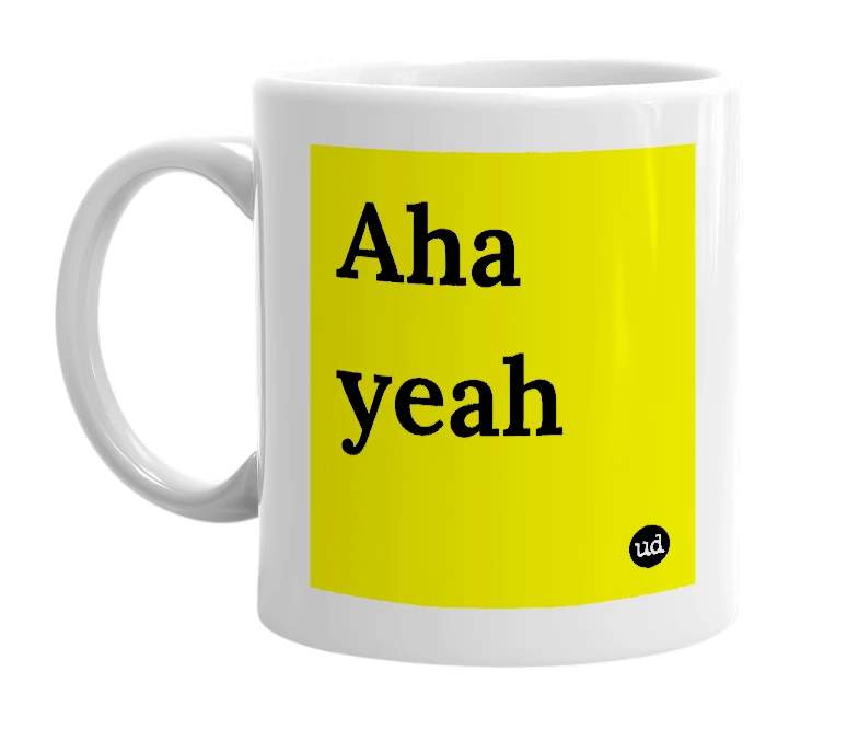 White mug with 'Aha yeah' in bold black letters