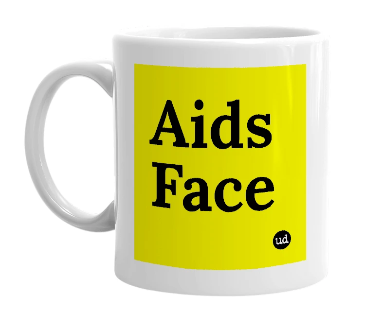 White mug with 'Aids Face' in bold black letters