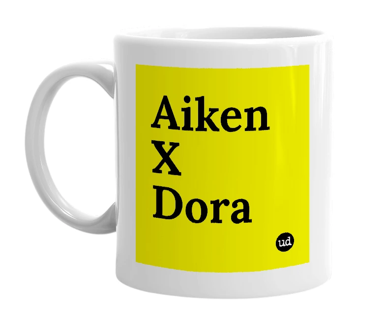 White mug with 'Aiken X Dora' in bold black letters