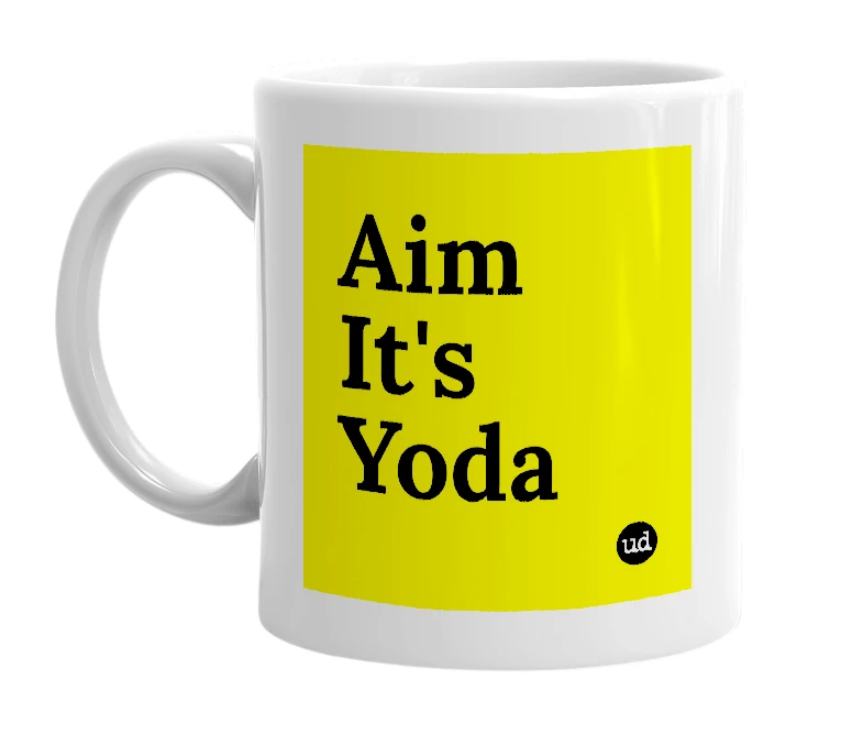 White mug with 'Aim It's Yoda' in bold black letters