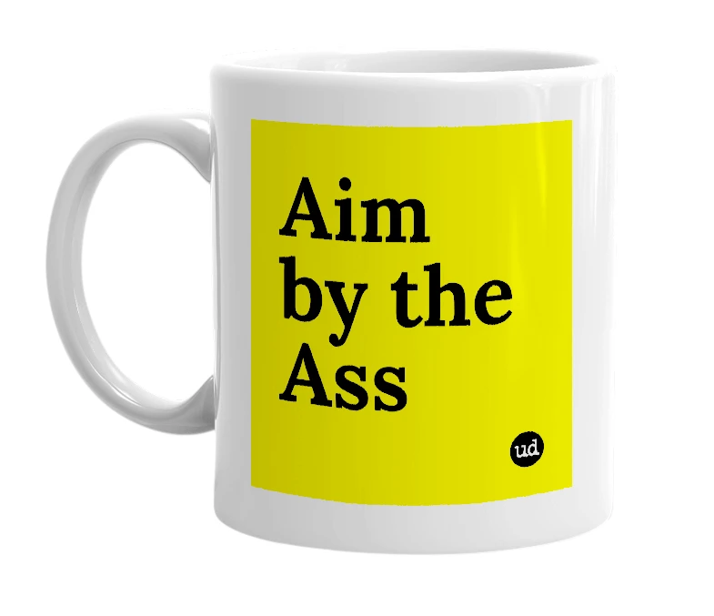 White mug with 'Aim by the Ass' in bold black letters