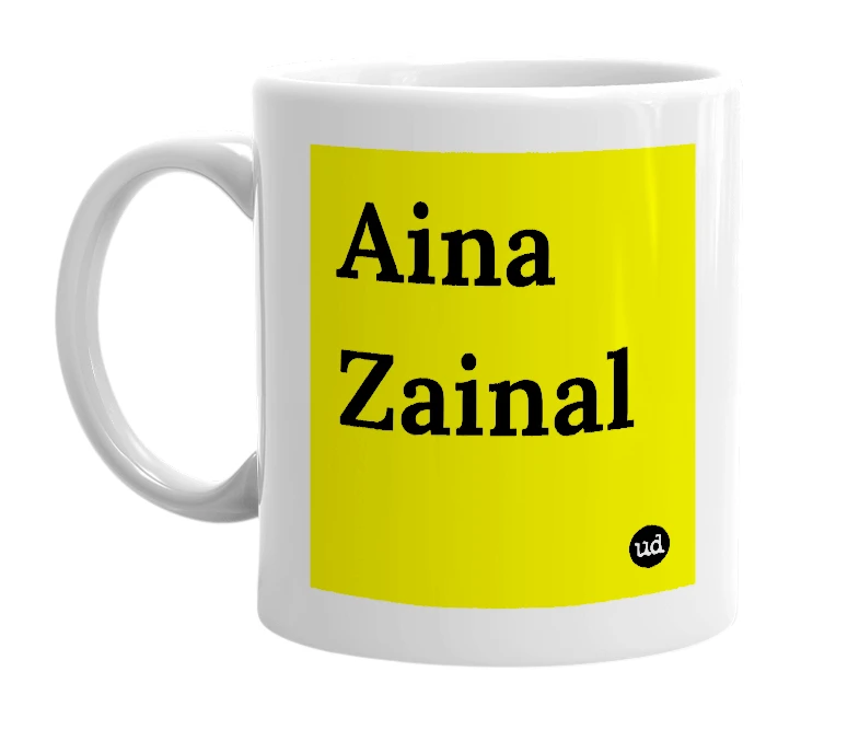 White mug with 'Aina Zainal' in bold black letters