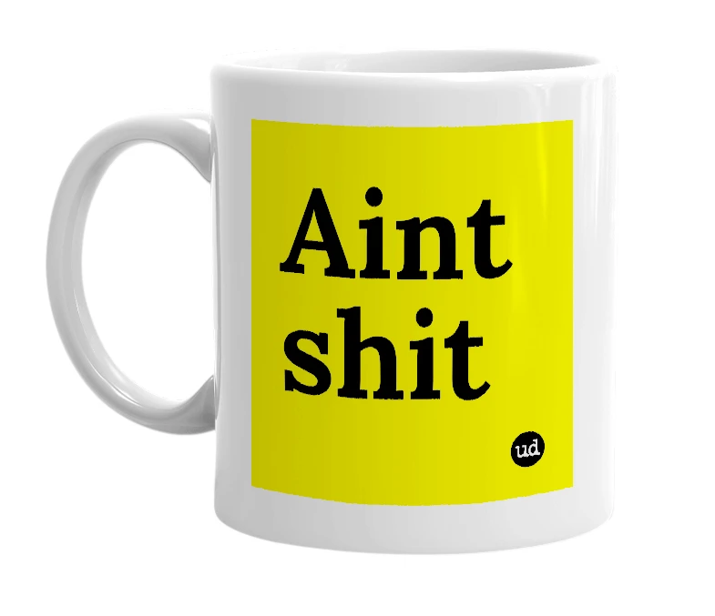 White mug with 'Aint shit' in bold black letters