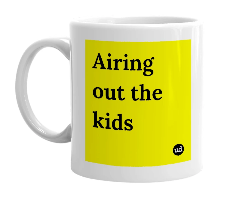 White mug with 'Airing out the kids' in bold black letters