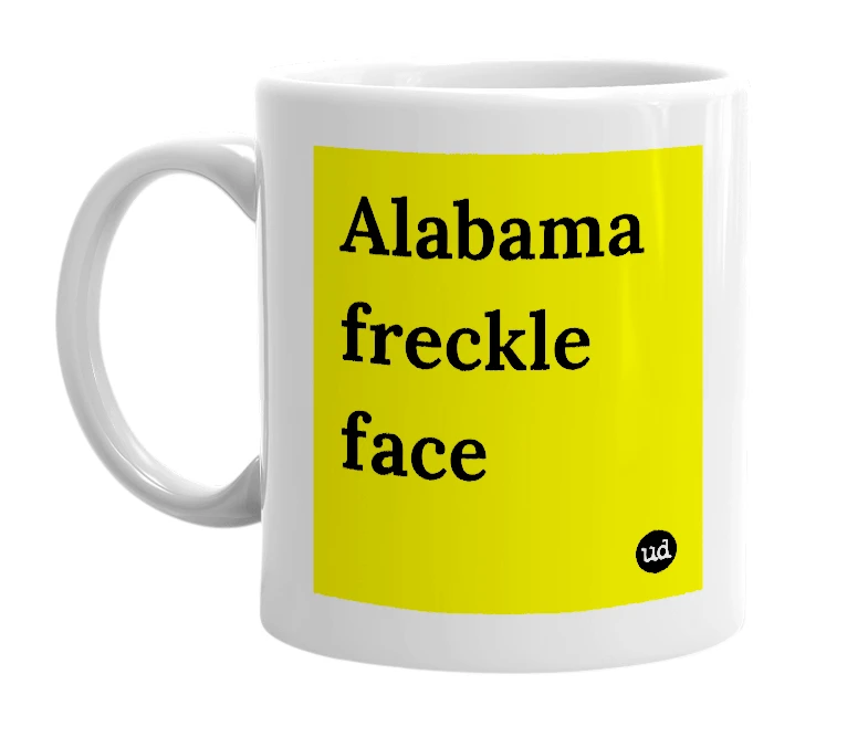 White mug with 'Alabama freckle face' in bold black letters
