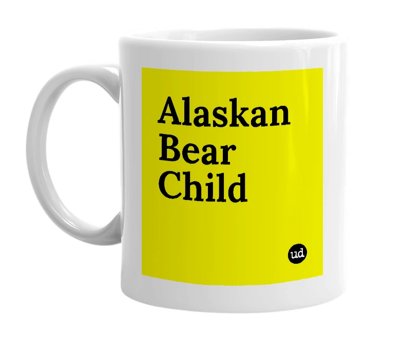 White mug with 'Alaskan Bear Child' in bold black letters