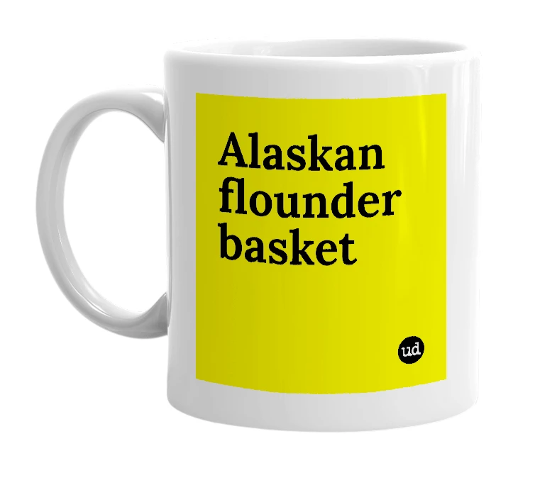 White mug with 'Alaskan flounder basket' in bold black letters