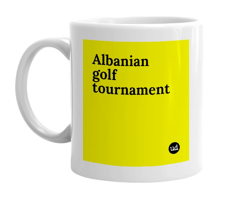 White mug with 'Albanian golf tournament' in bold black letters