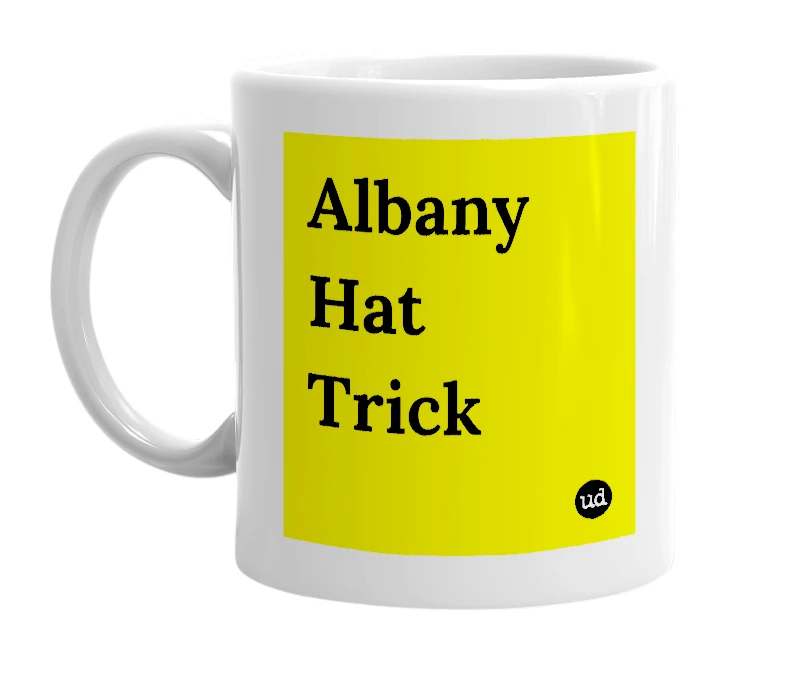 White mug with 'Albany Hat Trick' in bold black letters