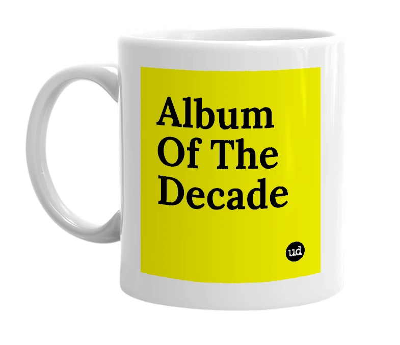 White mug with 'Album Of The Decade' in bold black letters