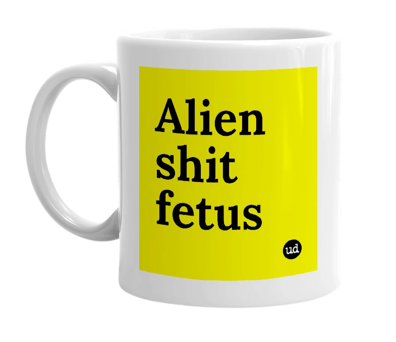 White mug with 'Alien shit fetus' in bold black letters