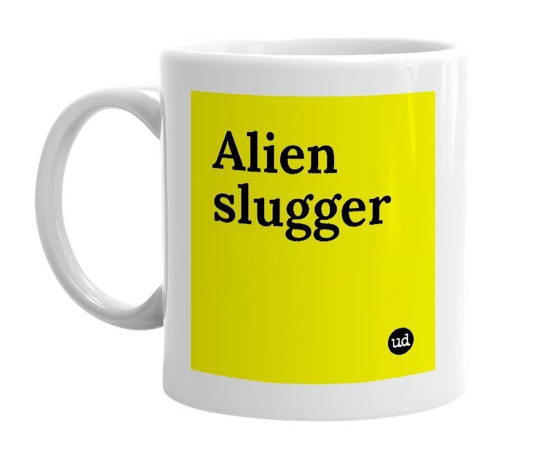 White mug with 'Alien slugger' in bold black letters