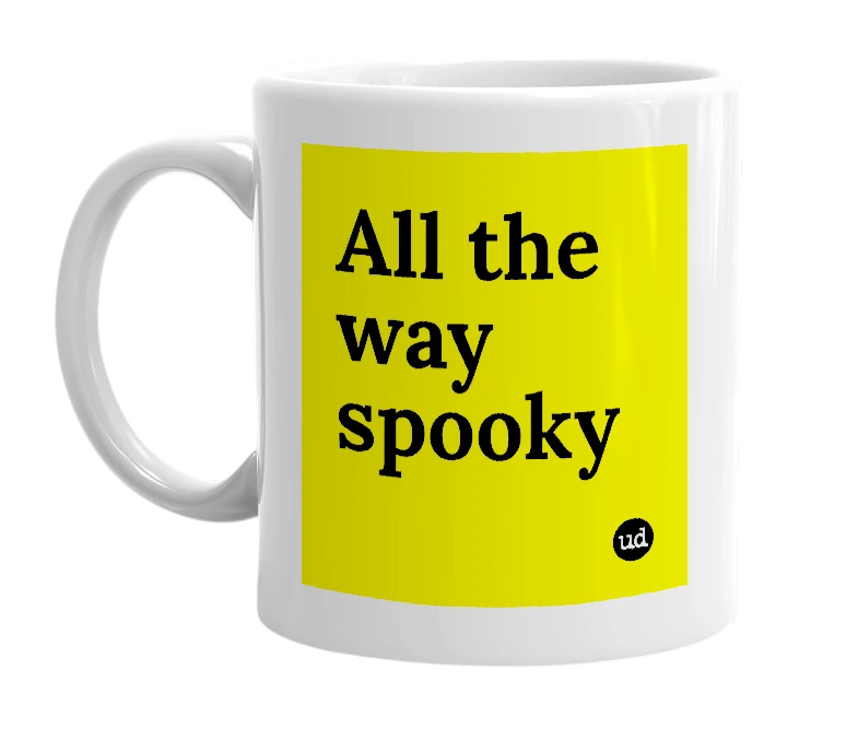 White mug with 'All the way spooky' in bold black letters