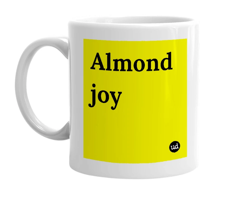 White mug with 'Almond joy' in bold black letters