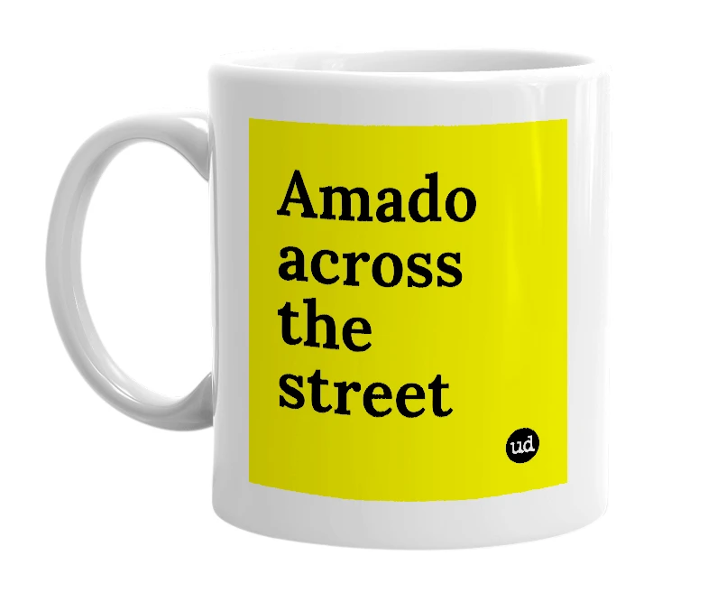 White mug with 'Amado across the street' in bold black letters