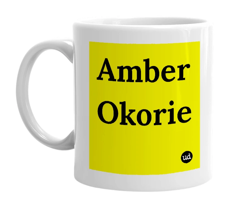 White mug with 'Amber Okorie' in bold black letters