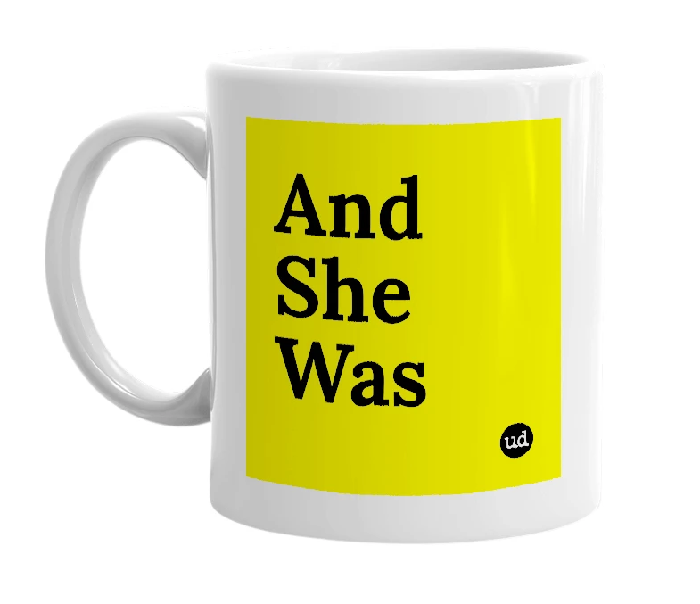 White mug with 'And She Was' in bold black letters
