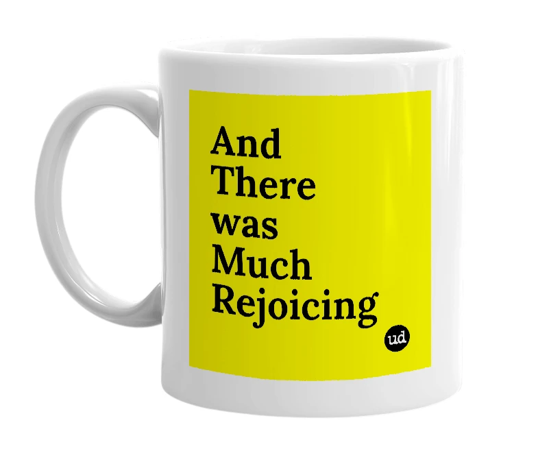 White mug with 'And There was Much Rejoicing' in bold black letters