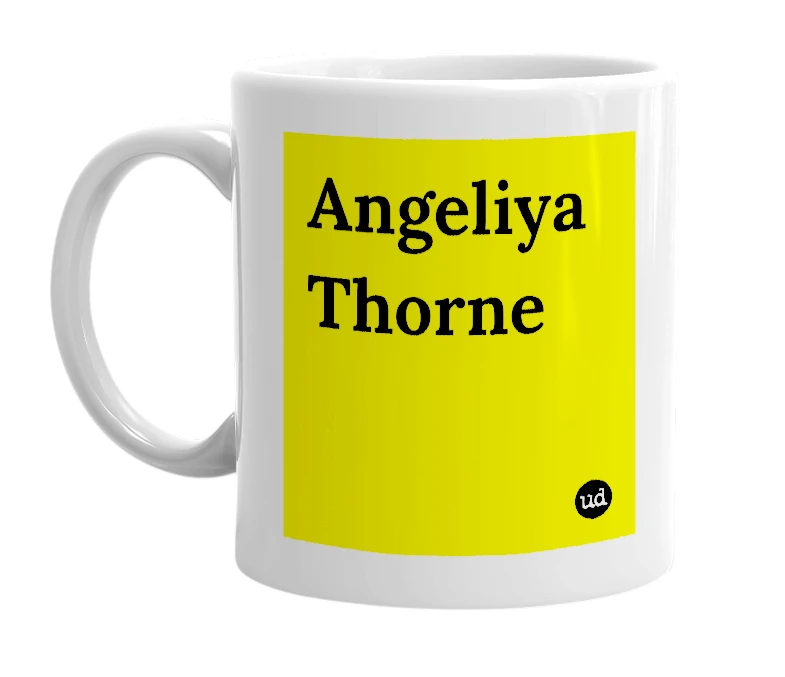 White mug with 'Angeliya Thorne' in bold black letters