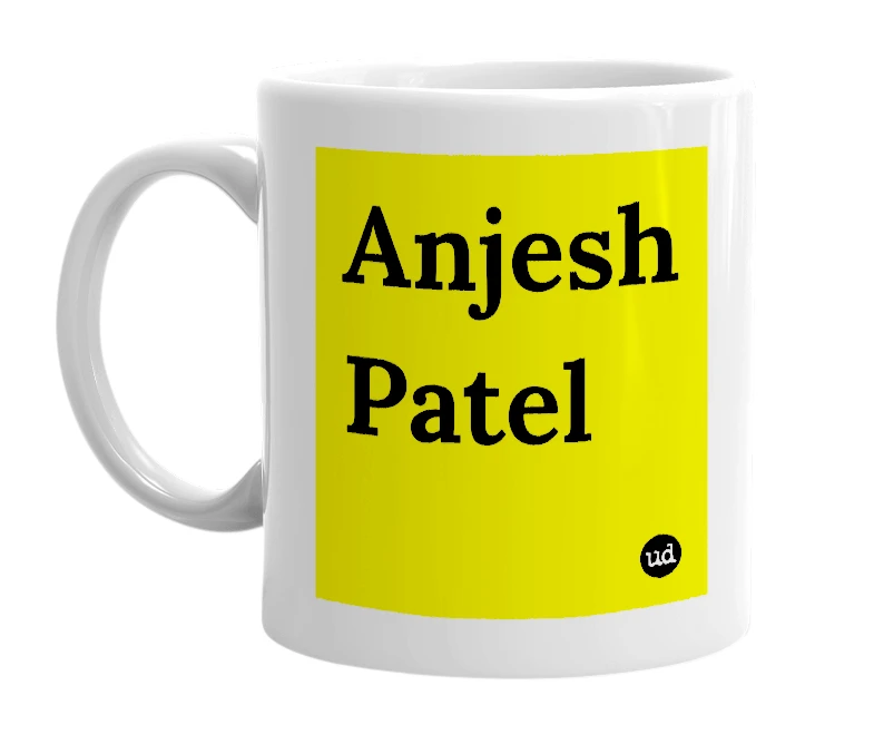 White mug with 'Anjesh Patel' in bold black letters