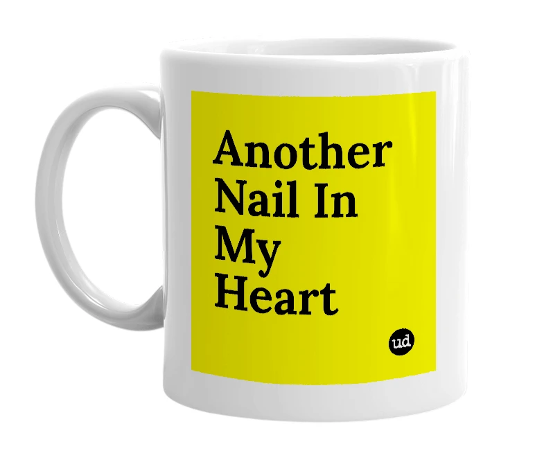 White mug with 'Another Nail In My Heart' in bold black letters