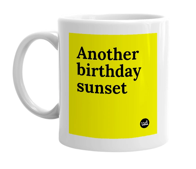 White mug with 'Another birthday sunset' in bold black letters