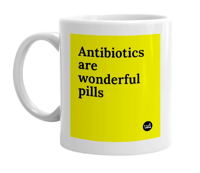 White mug with 'Antibiotics are wonderful pills' in bold black letters