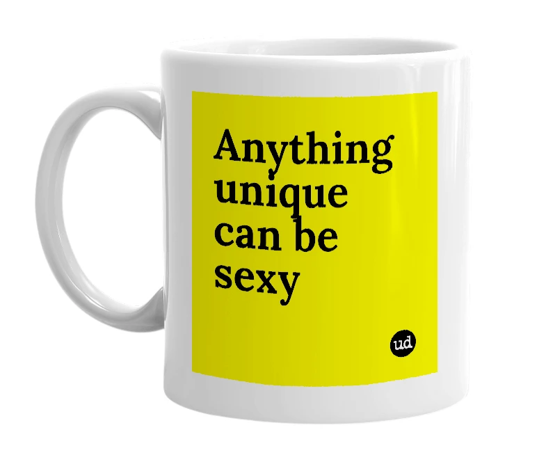 White mug with 'Anything unique can be sexy' in bold black letters