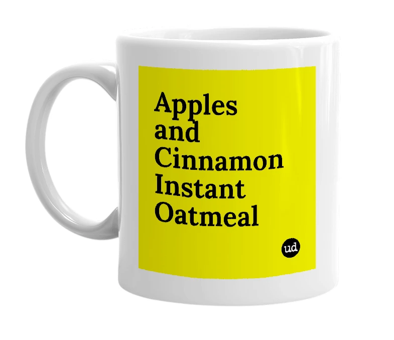 White mug with 'Apples and Cinnamon Instant Oatmeal' in bold black letters
