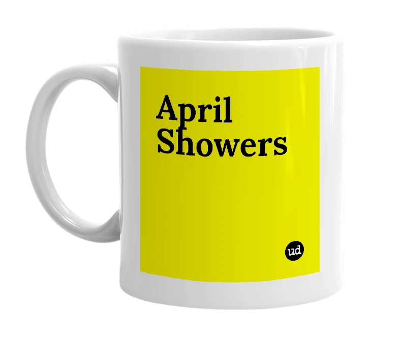 White mug with 'April Showers' in bold black letters