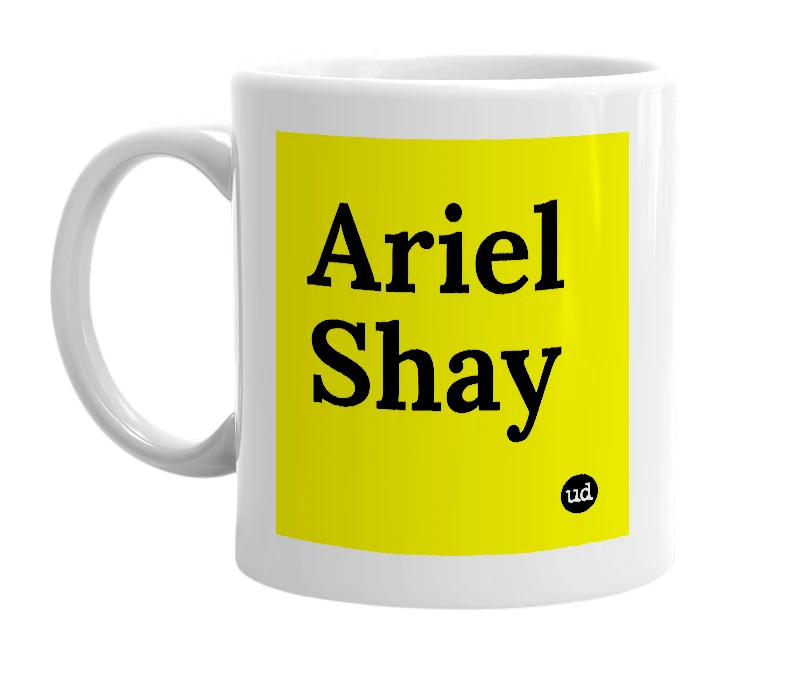 White mug with 'Ariel Shay' in bold black letters