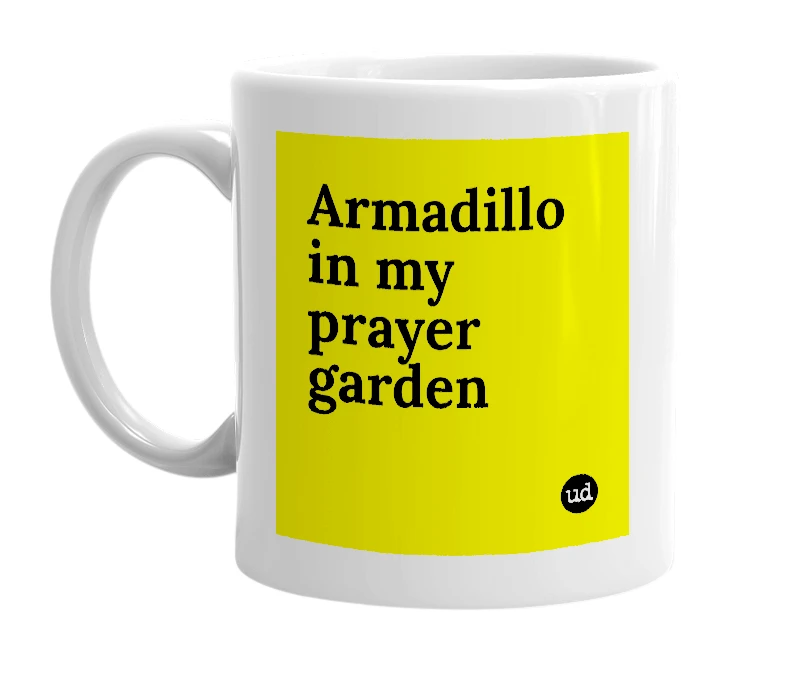 White mug with 'Armadillo in my prayer garden' in bold black letters