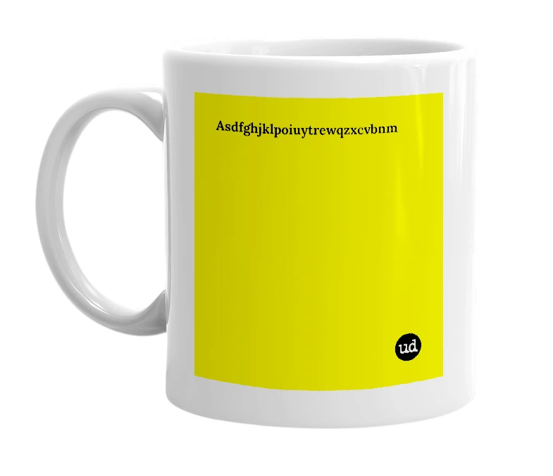 White mug with 'Asdfghjklpoiuytrewqzxcvbnm' in bold black letters