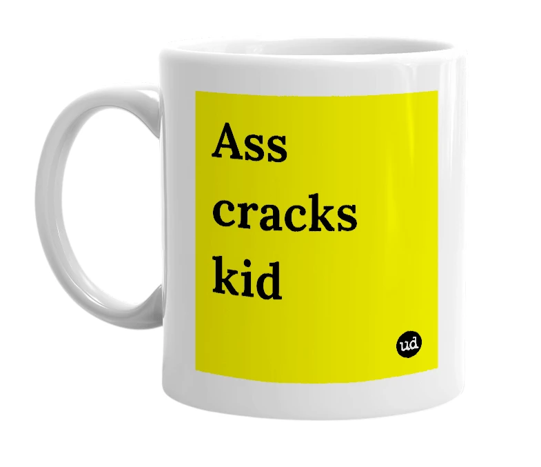 White mug with 'Ass cracks kid' in bold black letters