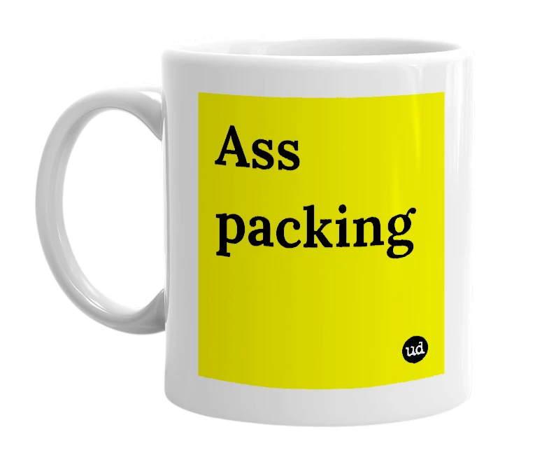 White mug with 'Ass packing' in bold black letters