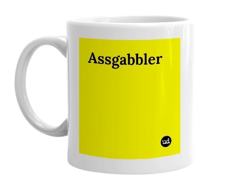 White mug with 'Assgabbler' in bold black letters