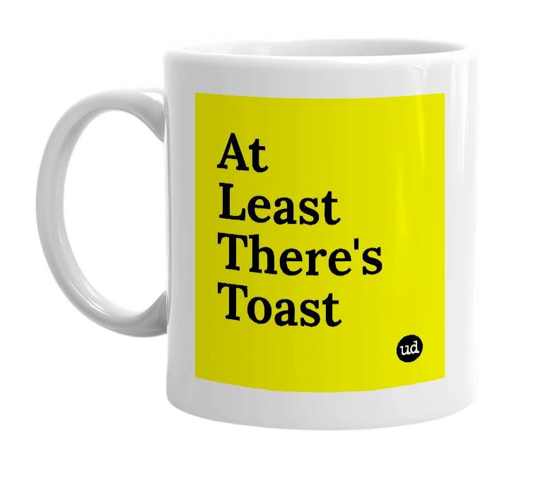 White mug with 'At Least There's Toast' in bold black letters