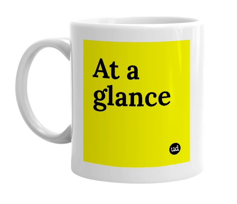 White mug with 'At a glance' in bold black letters