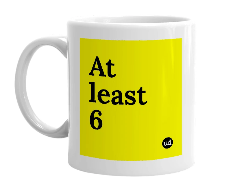 White mug with 'At least 6' in bold black letters
